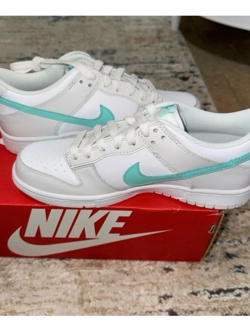 Nike White Low-Top Sneakers with Peach Swoosh
